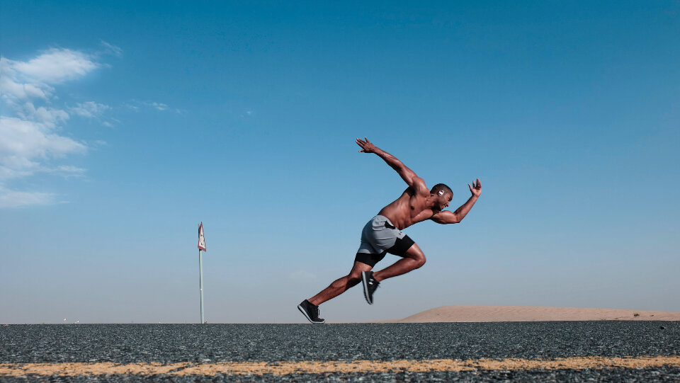 A runner on an empty road
